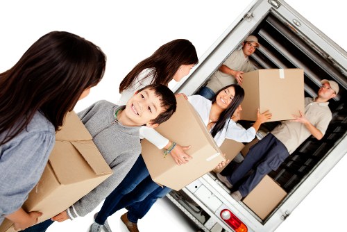 Office relocation planning in Keston with moving checklist and boxes