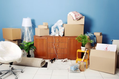 Professional team handling office furniture during a Keston relocation