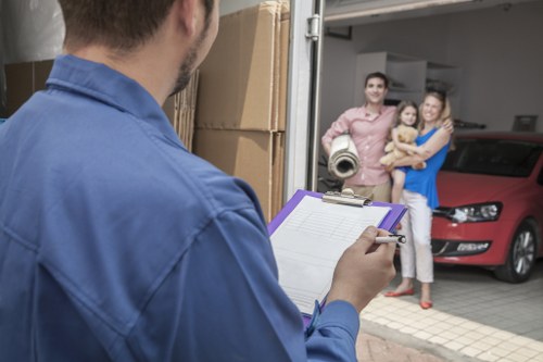 Careful moving of furniture through a flat staircase in Keston