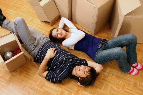 A student moving boxes during term change with local storage support in Keston