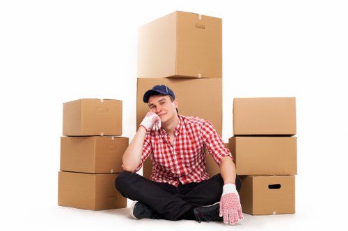 Professional removals team handling furniture in Keston